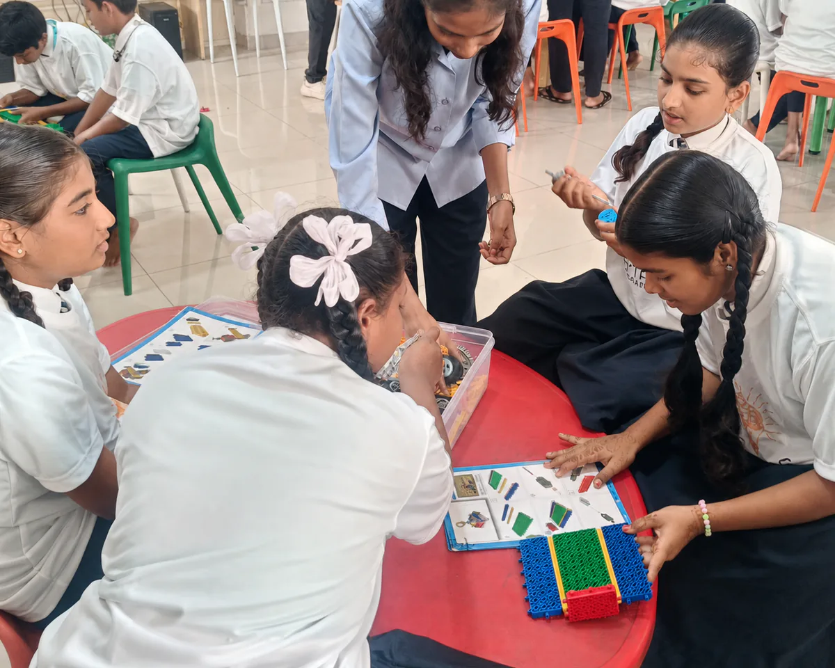 Students learning with an instructor at an AYTAS workshop