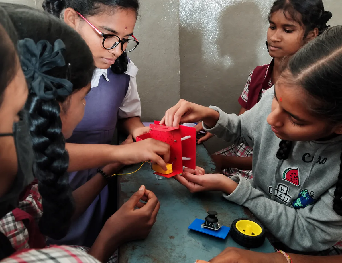 Students assembling an electronics project